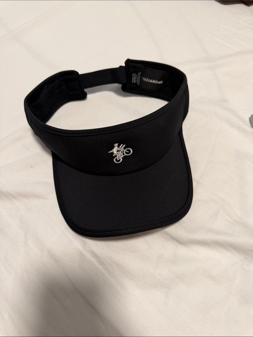 Sport-Tek Black Visor with Embroidered Bicyclist Logo